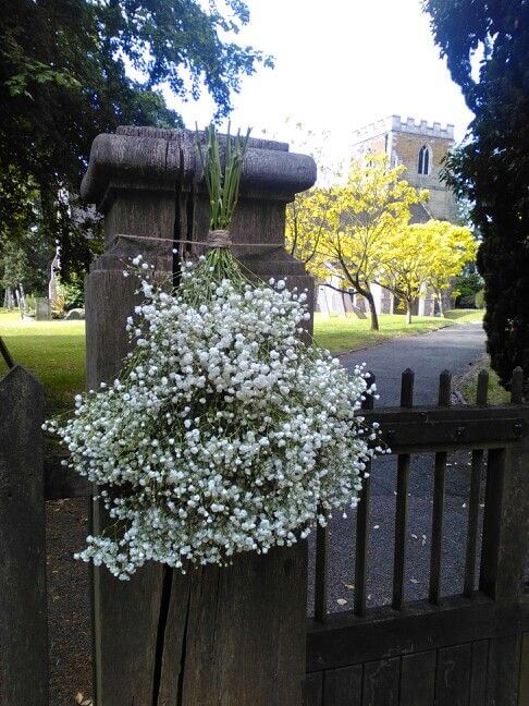 Gypsophila bunch on church gate post